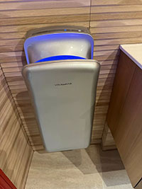 Electric hand dryer with forced air in the bathroom