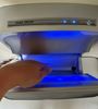 Grey vertical pulsed air hand dryer