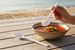 White reusable plastic spoon